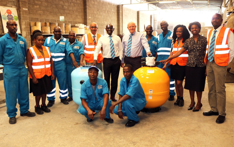 David Gatende picture with 20000th Dayliff DX CX Filter Image