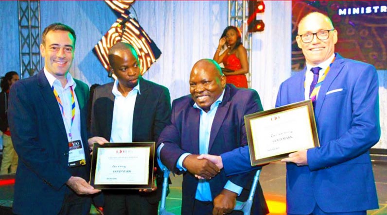 Group ICT Manager Joab Makungul and Digital Busienss Manager Ken Muturi are pictured as they collect their awards from Huawei's Adam Lane and Nutanix's Martin Walshaw at the CIO 100 prize giving ceremony.