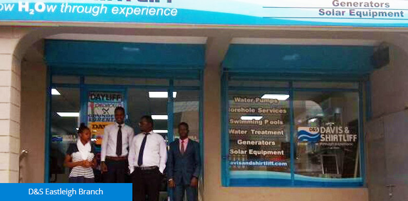 D&S Eastleigh Branch staff led by Manager Samuel Kibet stand outside their newly opened showroom