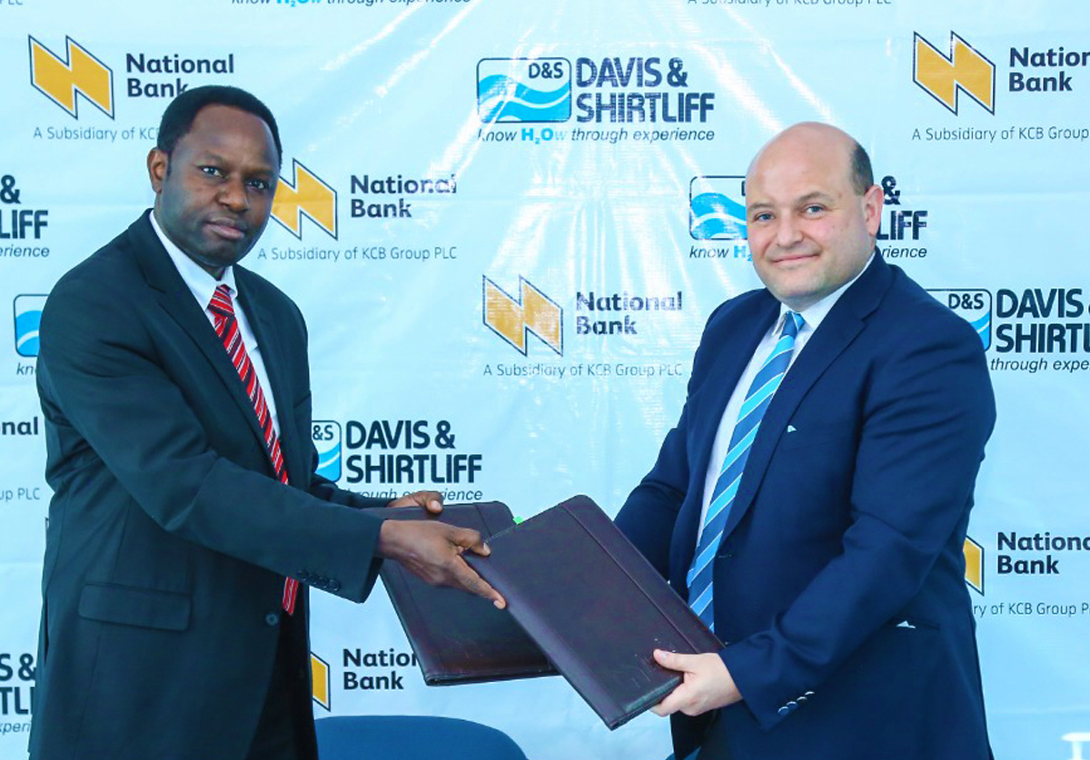 Davis & Shirtliff Managing Director Edward Davis signs Partnership with National Bank of Kenya CFO Peter Kioko